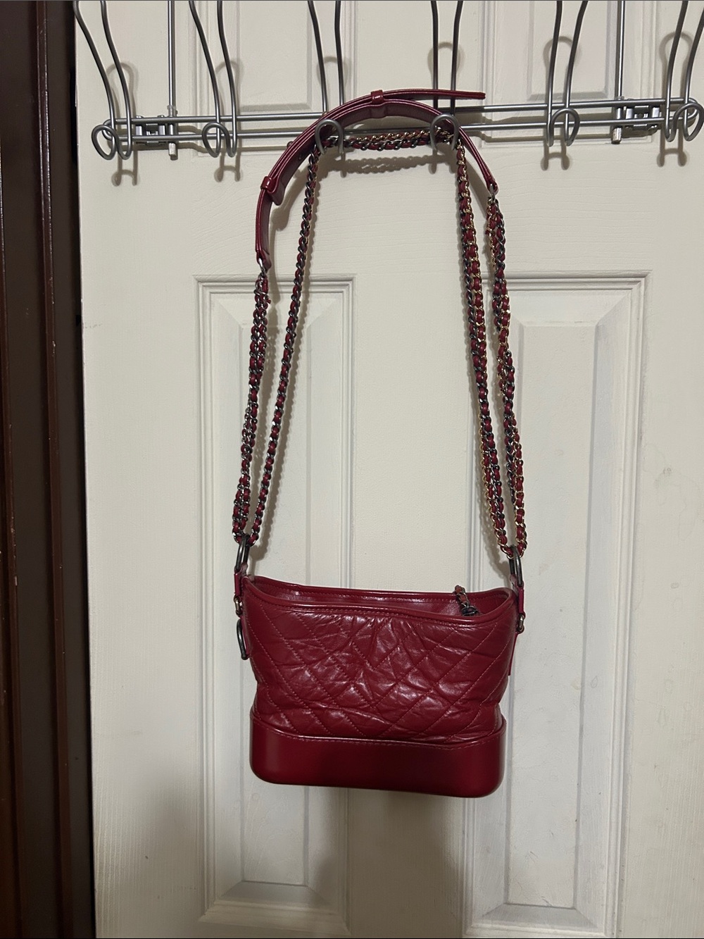 CHANEL Quilted Red Leather Crossbody Bag with Chain Strap